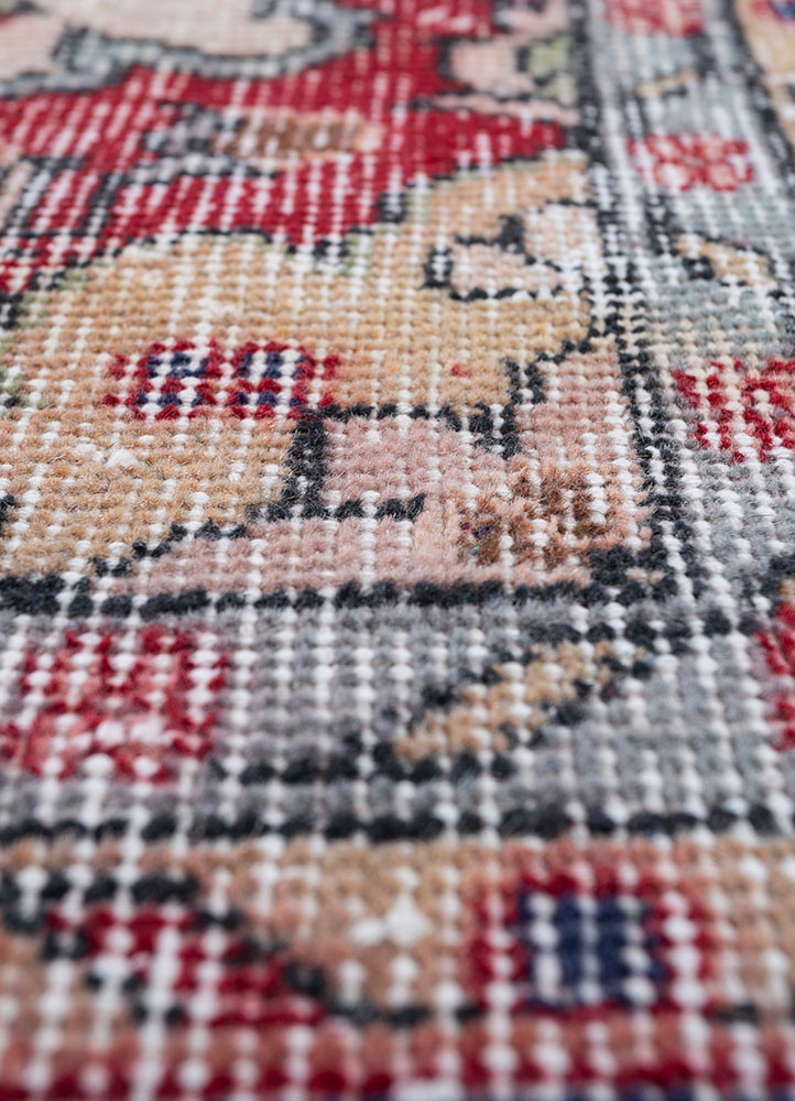 vintage red and orange wool hand knotted Rug - CloseUp