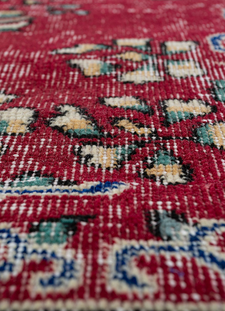 vintage red and orange wool hand knotted Rug - CloseUp