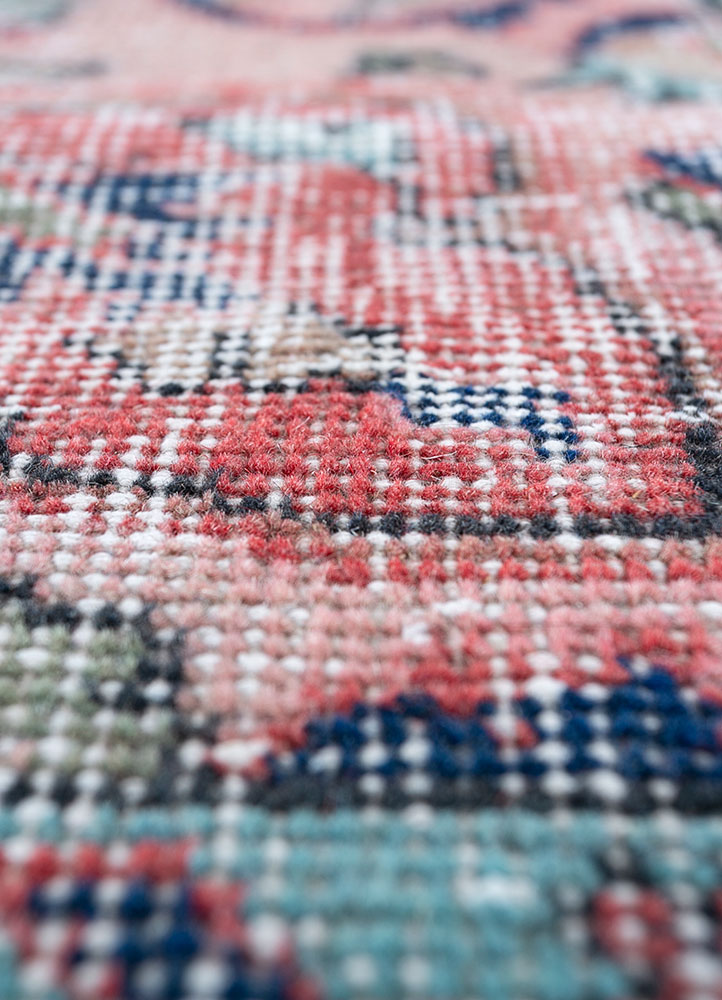 vintage red and orange wool hand knotted Rug - CloseUp