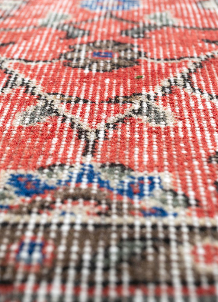vintage red and orange wool hand knotted Rug - CloseUp