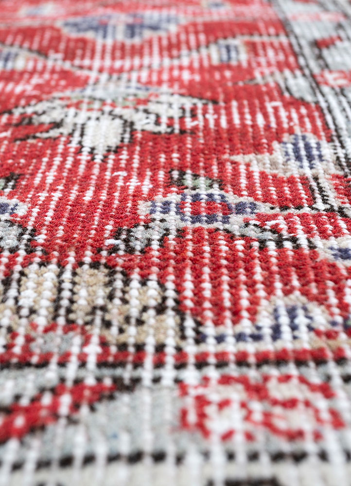 vintage red and orange wool hand knotted Rug - CloseUp