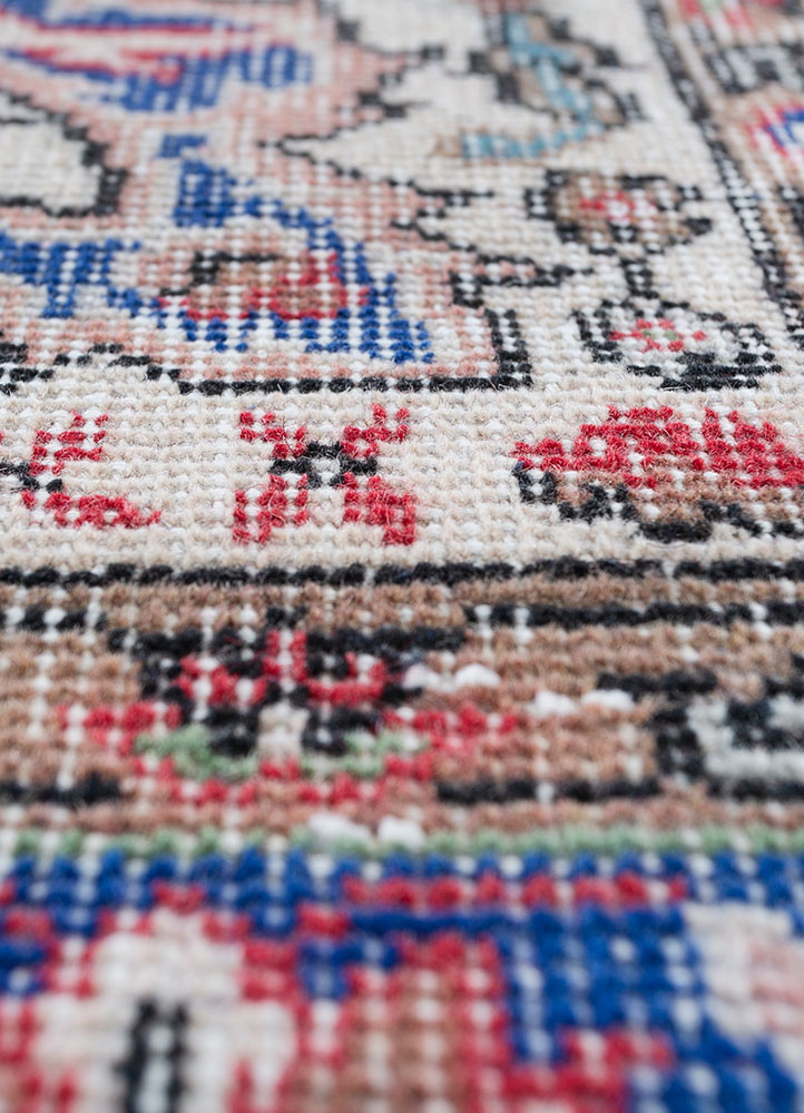 vintage red and orange wool hand knotted Rug - CloseUp