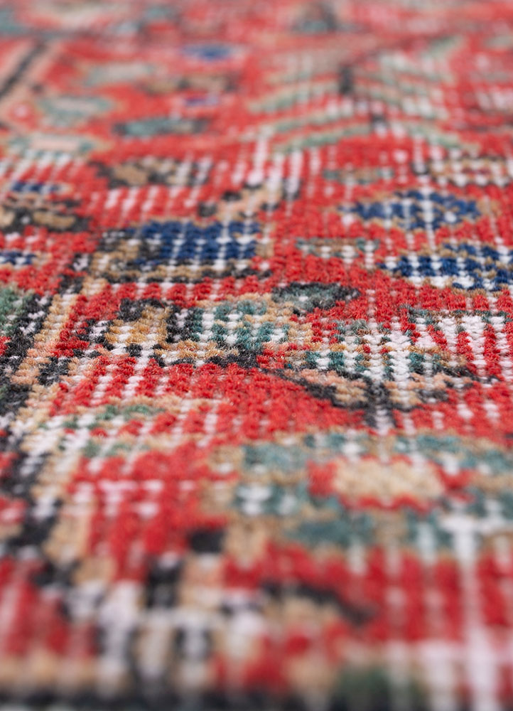vintage red and orange wool hand knotted Rug - CloseUp