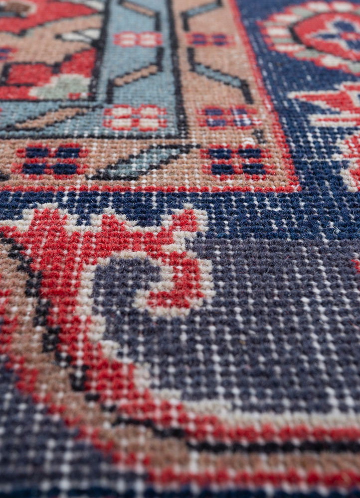 vintage red and orange wool hand knotted Rug - CloseUp