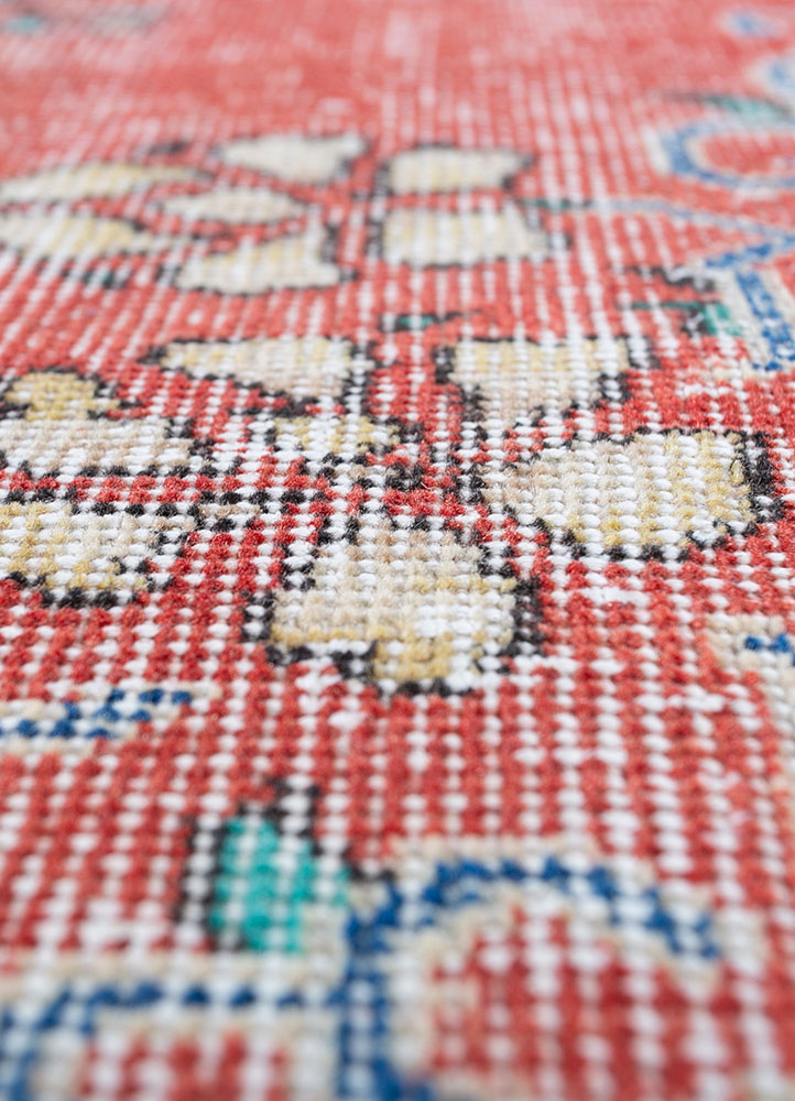 vintage red and orange wool hand knotted Rug - CloseUp