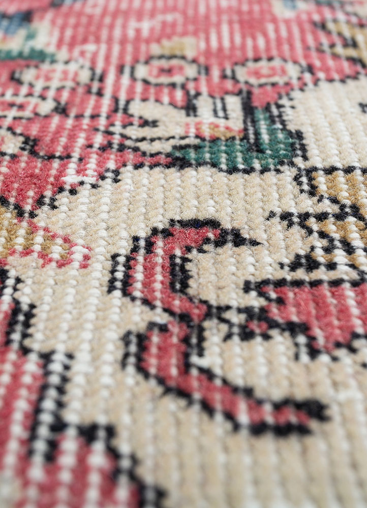 vintage red and orange wool hand knotted Rug - CloseUp