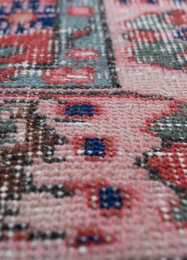 vintage red and orange wool hand knotted Rug - CloseUp