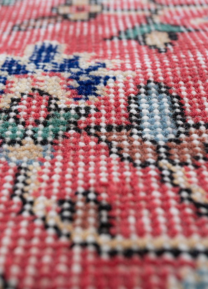 vintage red and orange wool hand knotted Rug - CloseUp