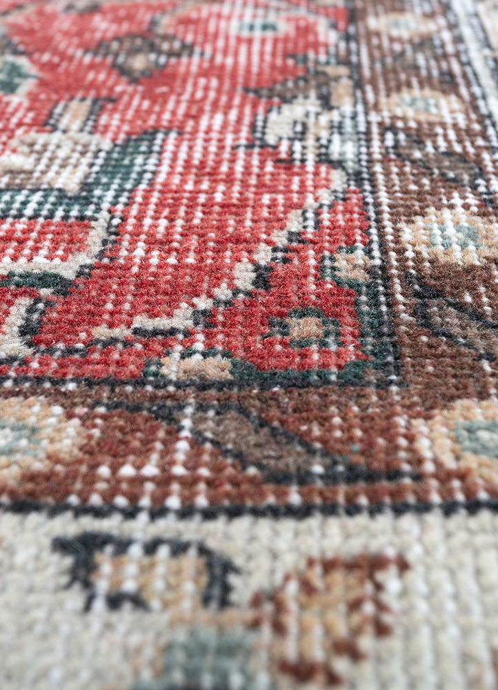 vintage red and orange wool hand knotted Rug - CloseUp