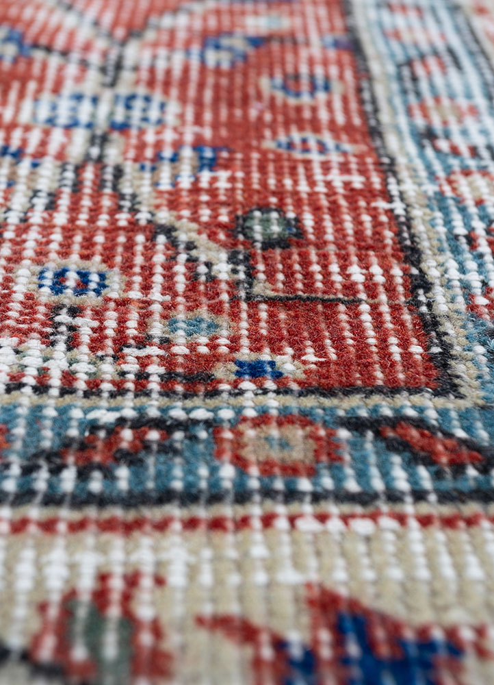 vintage red and orange wool hand knotted Rug - CloseUp