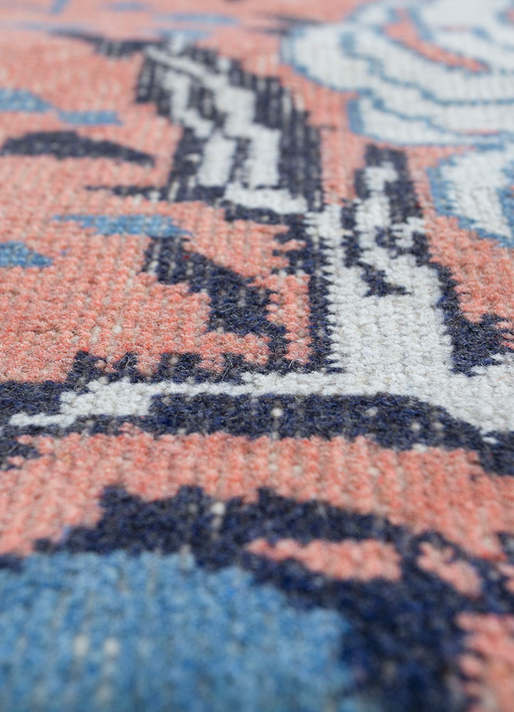 vintage red and orange wool hand knotted Rug - CloseUp