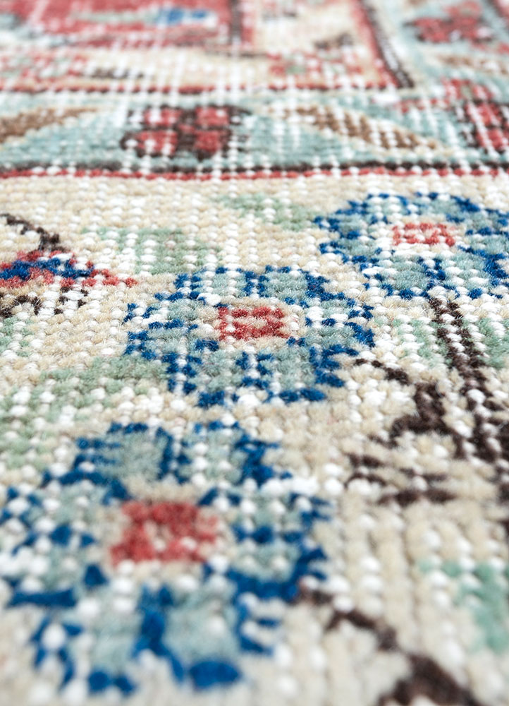 vintage red and orange wool hand knotted Rug - CloseUp