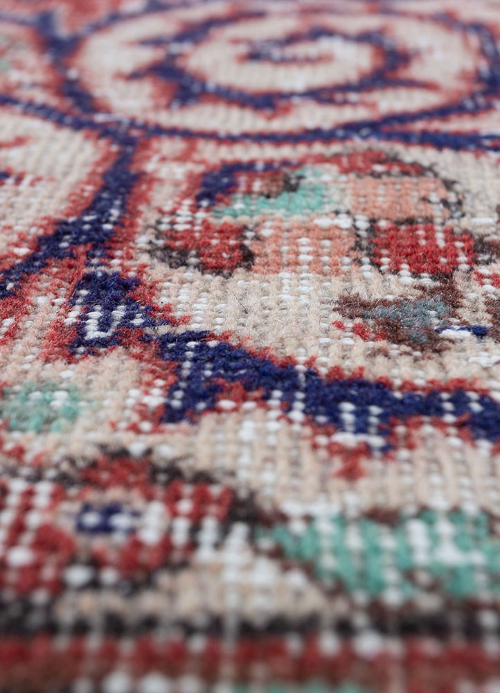vintage red and orange wool hand knotted Rug - CloseUp