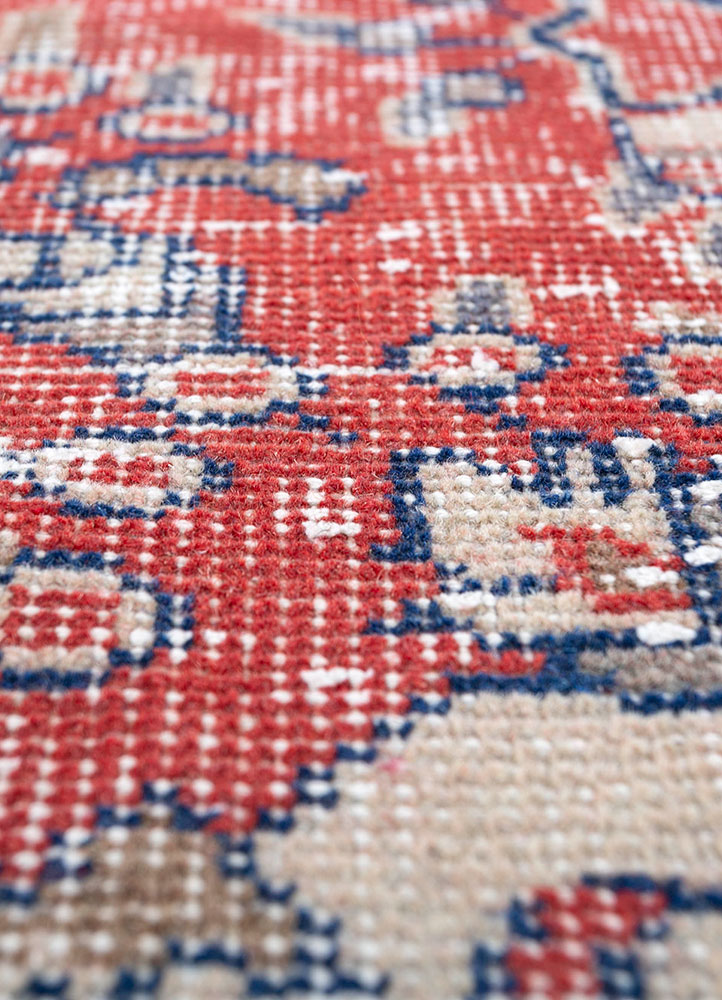 vintage red and orange wool hand knotted Rug - CloseUp