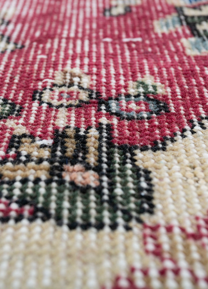 vintage red and orange wool hand knotted Rug - CloseUp