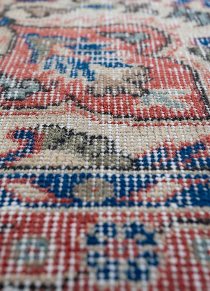 vintage red and orange wool hand knotted Rug - CloseUp