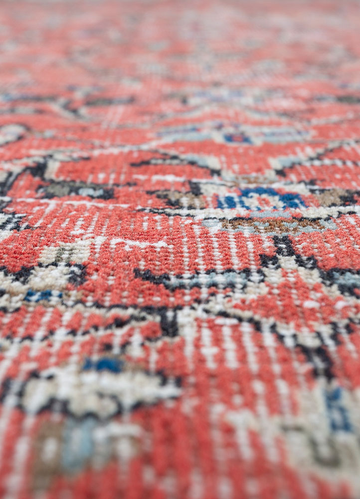 vintage red and orange wool hand knotted Rug - CloseUp