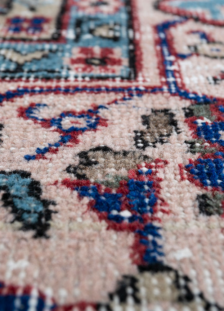 vintage red and orange wool hand knotted Rug - CloseUp