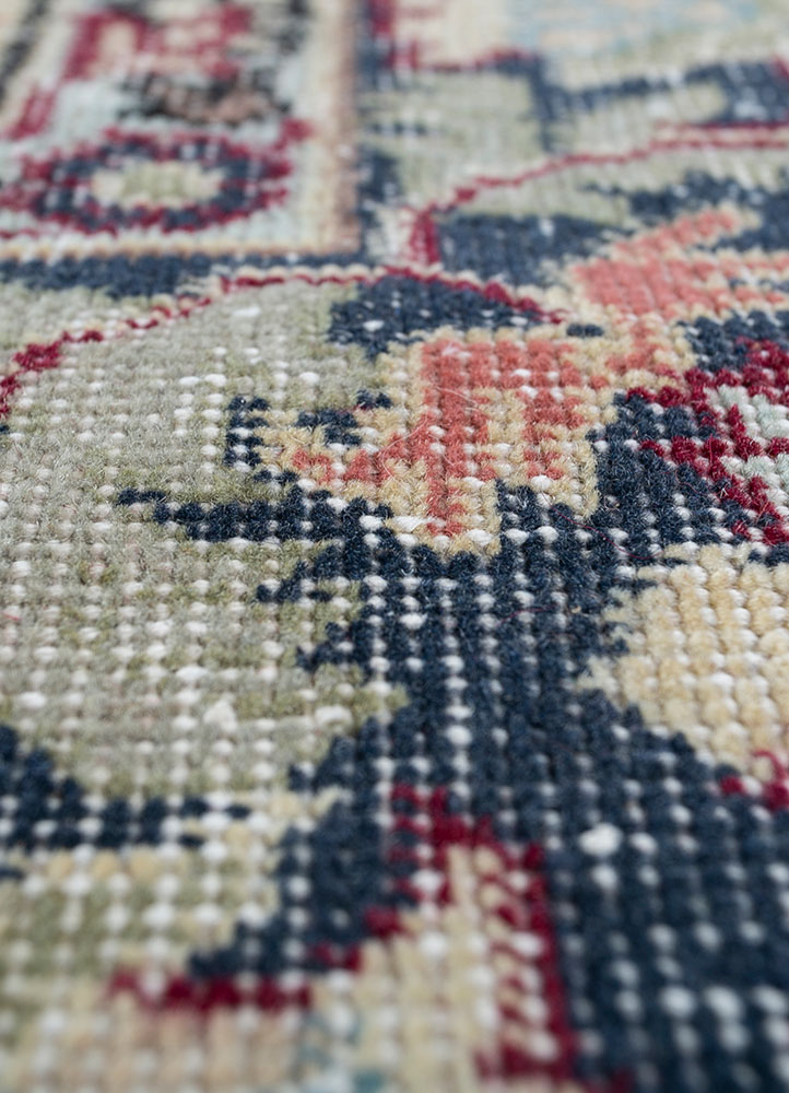 vintage red and orange wool hand knotted Rug - CloseUp