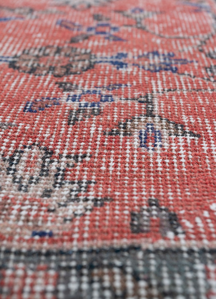 vintage red and orange wool hand knotted Rug - CloseUp