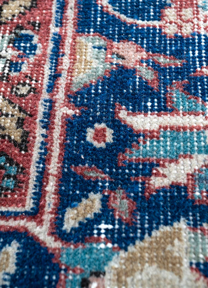 vintage red and orange wool hand knotted Rug - CloseUp