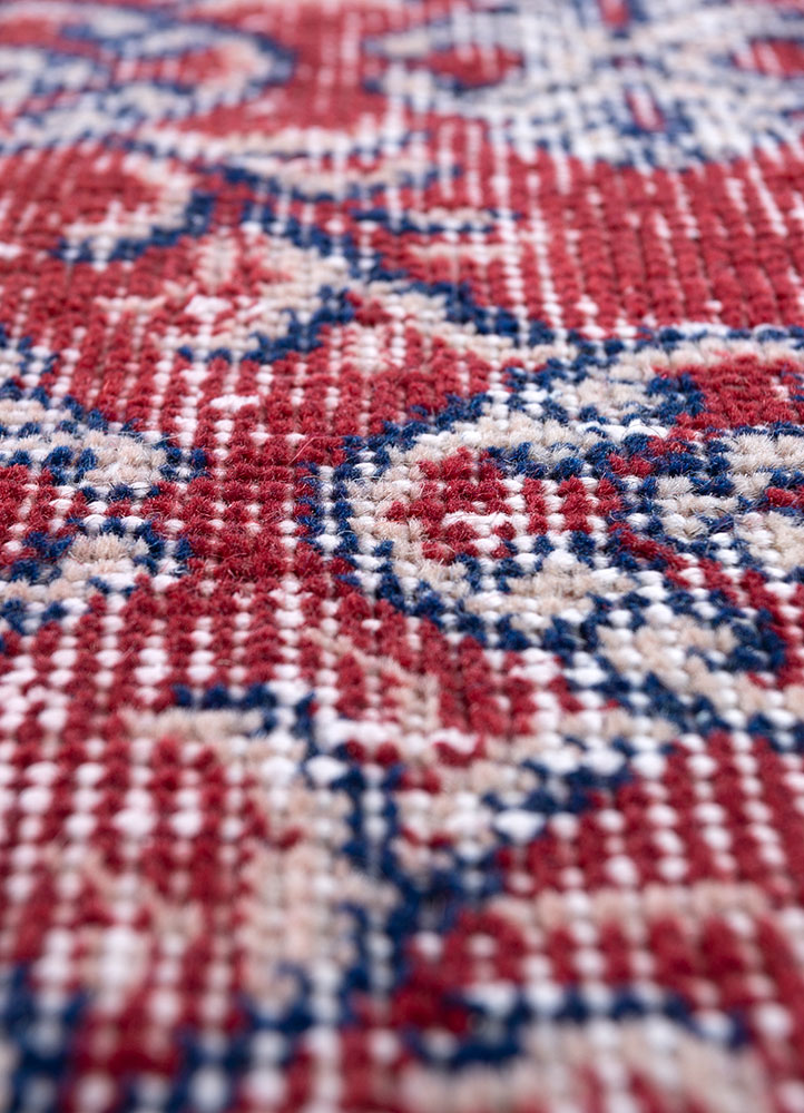 vintage red and orange wool hand knotted Rug - CloseUp