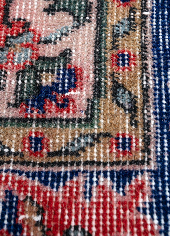 vintage red and orange wool hand knotted Rug - CloseUp
