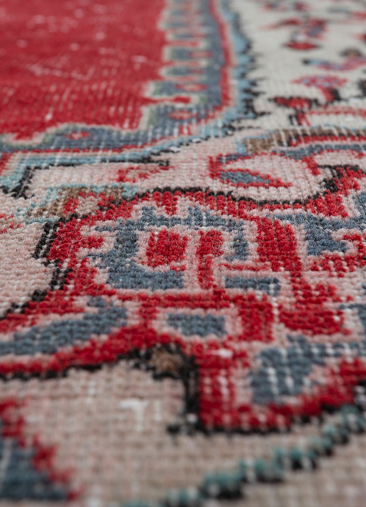 vintage red and orange wool hand knotted Rug - CloseUp