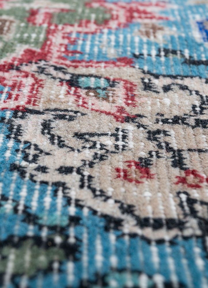 vintage red and orange wool hand knotted Rug - CloseUp