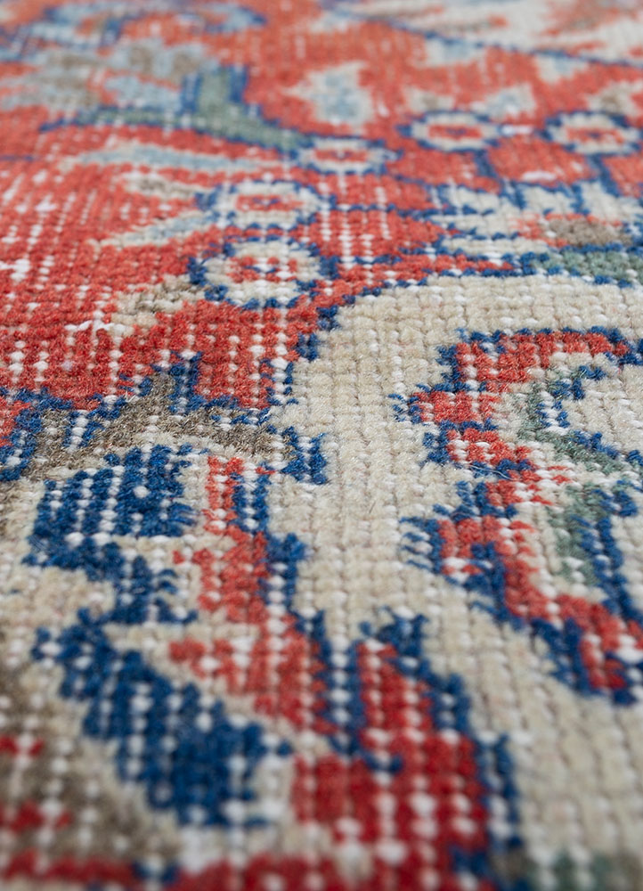 vintage red and orange wool hand knotted Rug - CloseUp