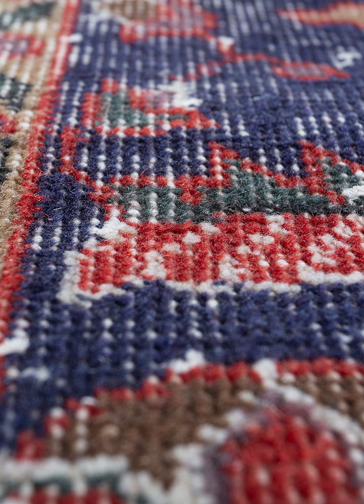vintage red and orange wool hand knotted Rug - CloseUp