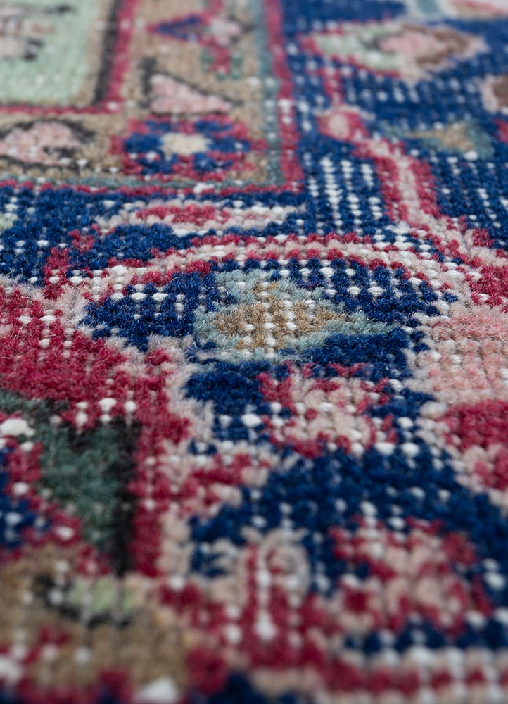 vintage pink and purple wool hand knotted Rug - CloseUp