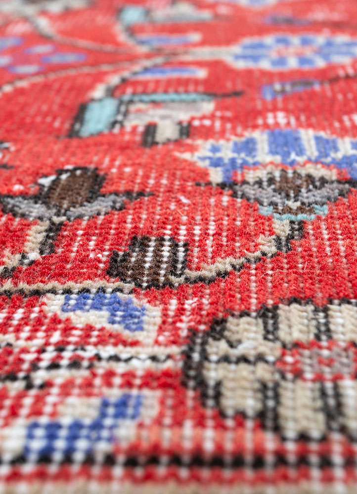 vintage red and orange wool hand knotted Rug - CloseUp