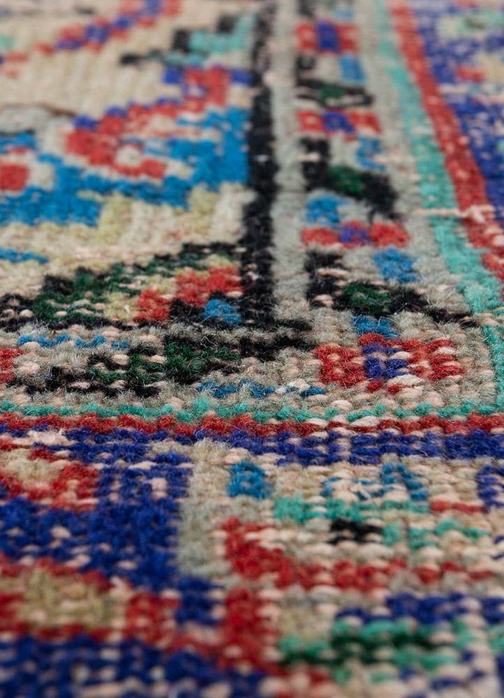 vintage red and orange wool hand knotted Rug - CloseUp