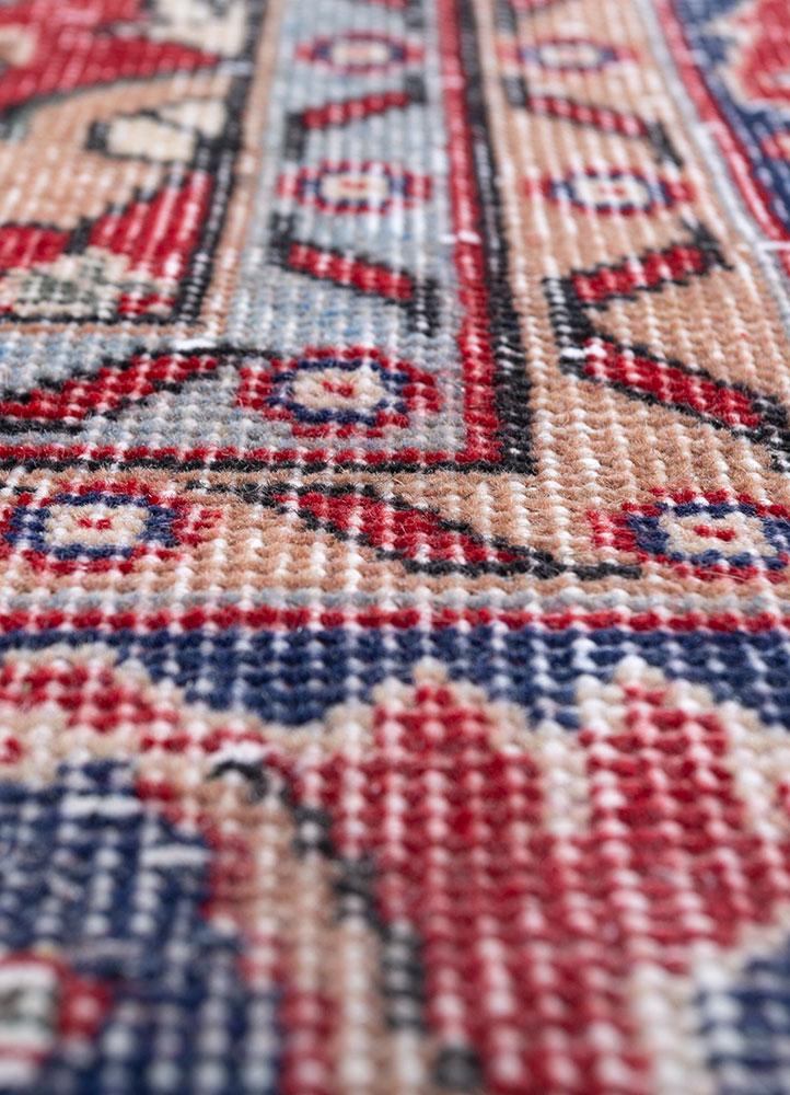 vintage red and orange wool hand knotted Rug - CloseUp