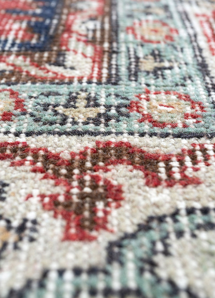 vintage red and orange wool hand knotted Rug - CloseUp