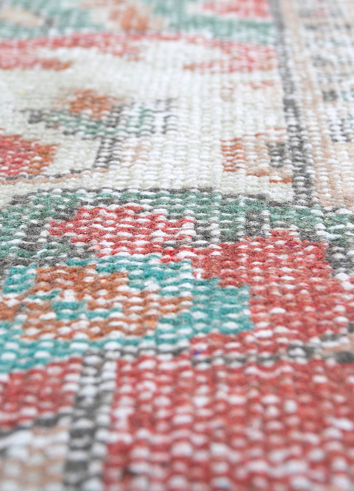 vintage red and orange wool hand knotted Rug - CloseUp