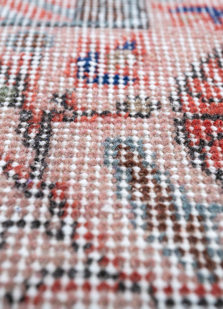vintage red and orange wool hand knotted Rug - CloseUp