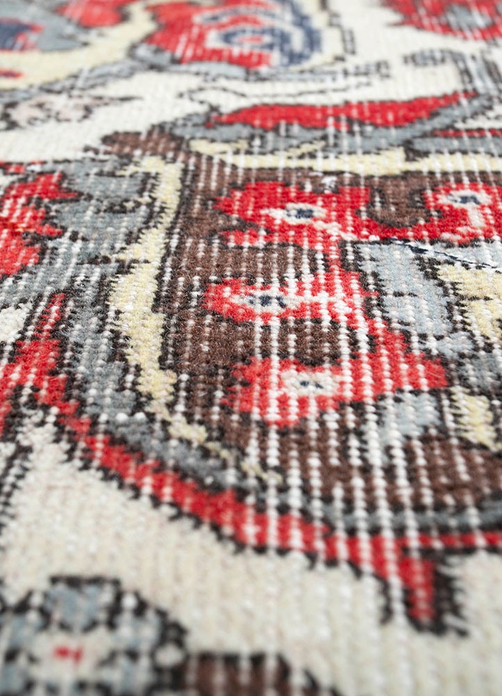 vintage red and orange wool hand knotted Rug - CloseUp