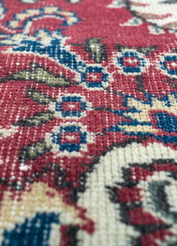 vintage red and orange wool hand knotted Rug - CloseUp