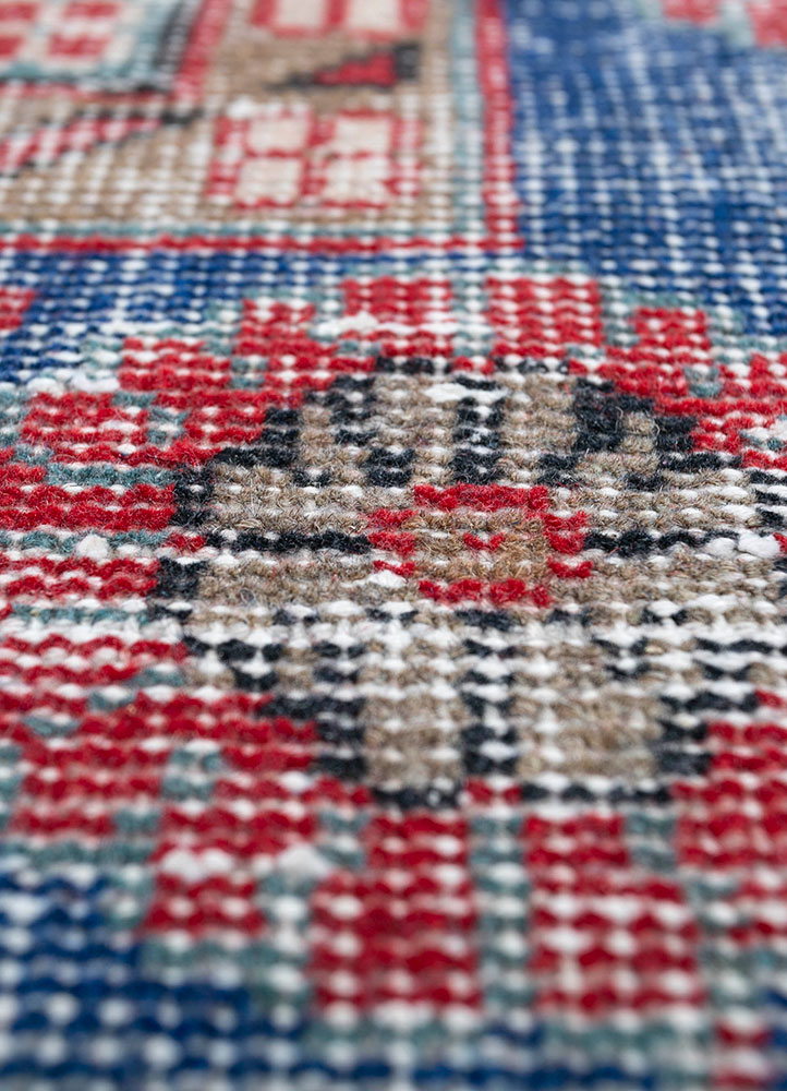 vintage red and orange wool hand knotted Rug - CloseUp