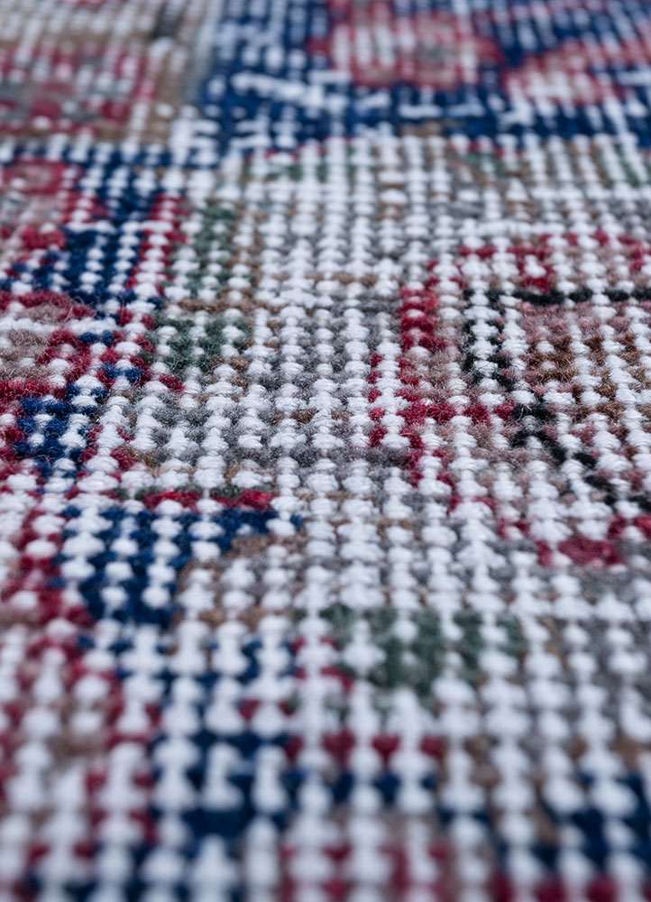 vintage red and orange wool hand knotted Rug - CloseUp