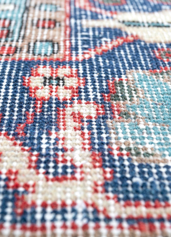 vintage red and orange wool hand knotted Rug - CloseUp