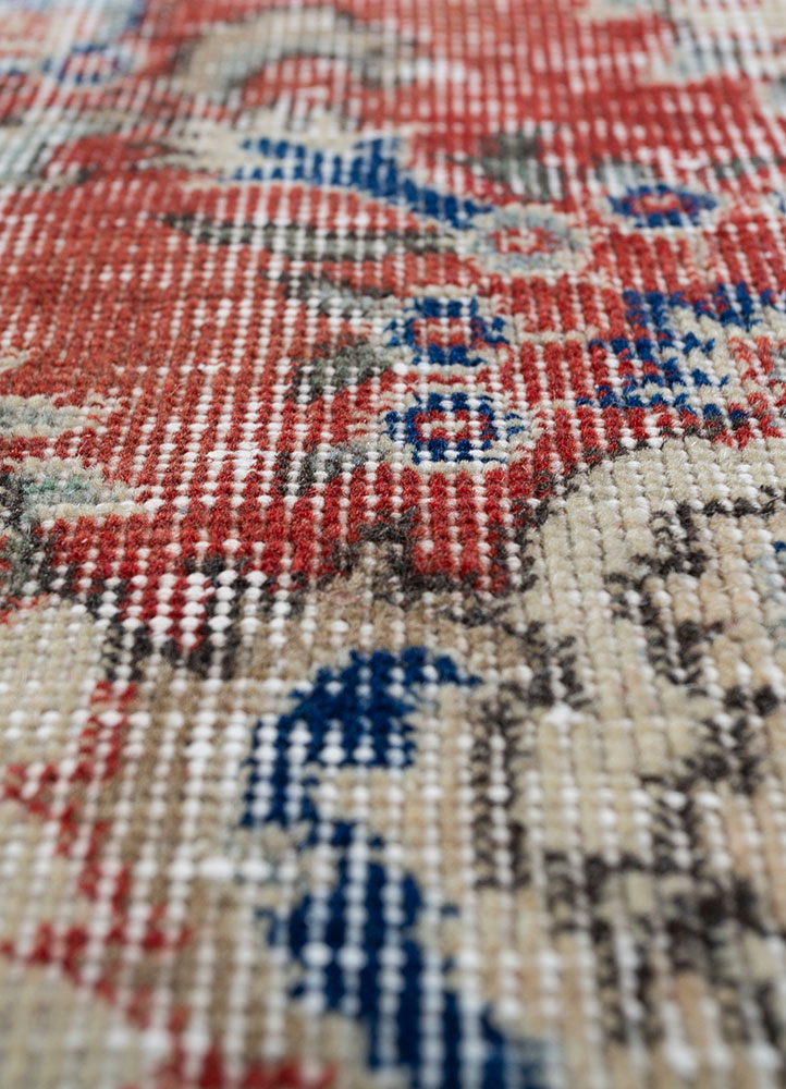 vintage red and orange wool hand knotted Rug - CloseUp
