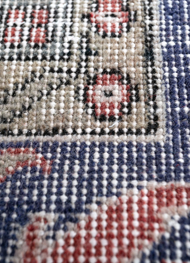 vintage red and orange wool hand knotted Rug - CloseUp