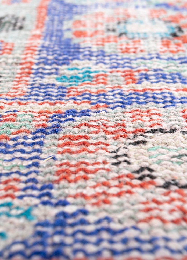 vintage red and orange wool hand knotted Rug - CloseUp