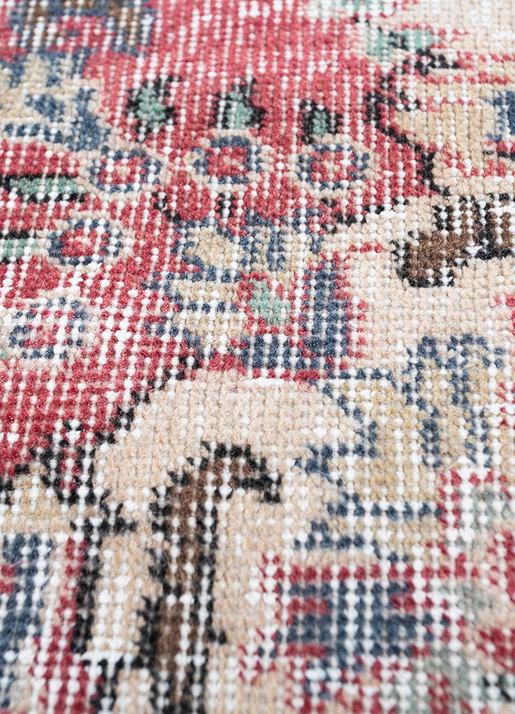 vintage red and orange wool hand knotted Rug - CloseUp