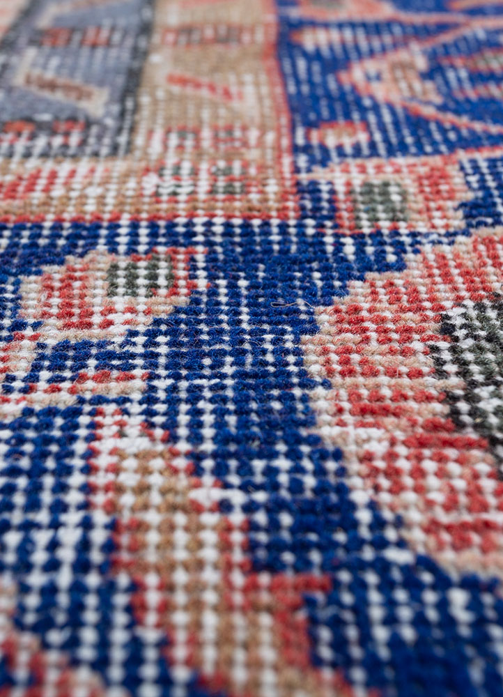 vintage red and orange wool hand knotted Rug - CloseUp