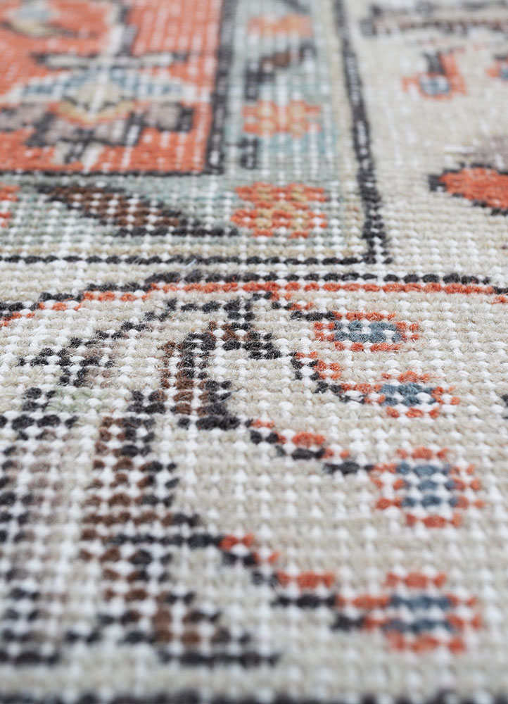 vintage red and orange wool hand knotted Rug - CloseUp