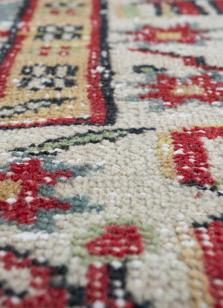 vintage red and orange wool hand knotted Rug - CloseUp